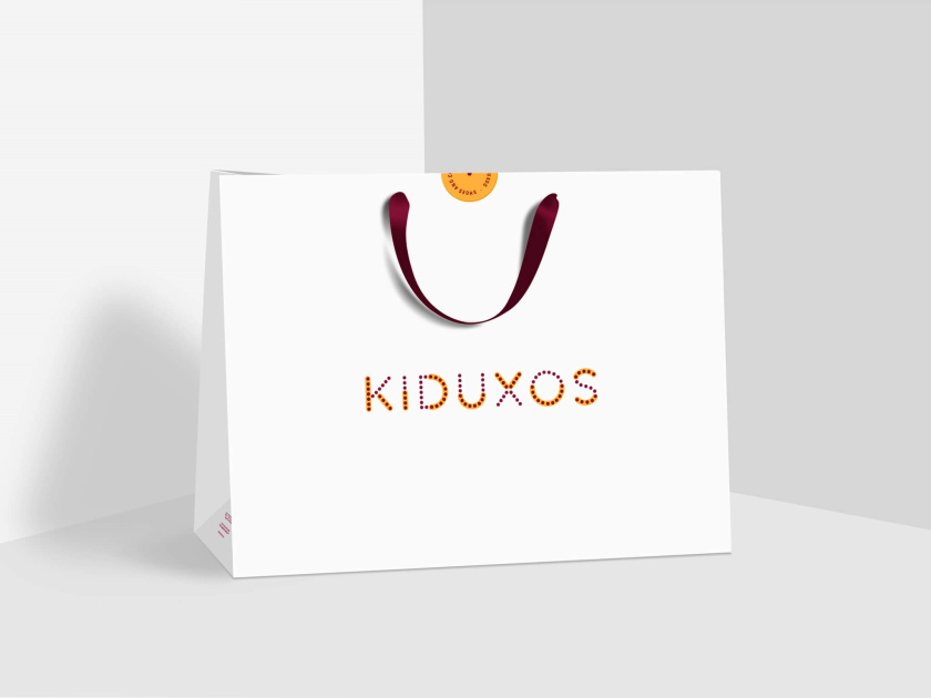 KIDUXOS兒童商店品牌logo設(shè)計(jì)vi設(shè)計(jì)與店鋪空間設(shè)計(jì)