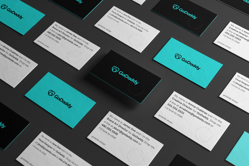 GoDaddy 域名注冊商和網(wǎng)站空間托管公司心形logo設(shè)計(jì)vi設(shè)計(jì)