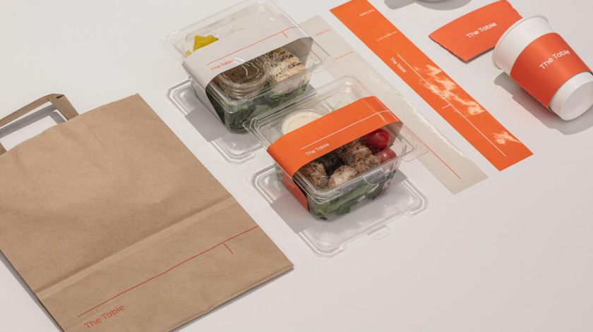 The Table 電信品牌vi視覺識別設(shè)計，與桌子結(jié)合的長長的T型水平線元素