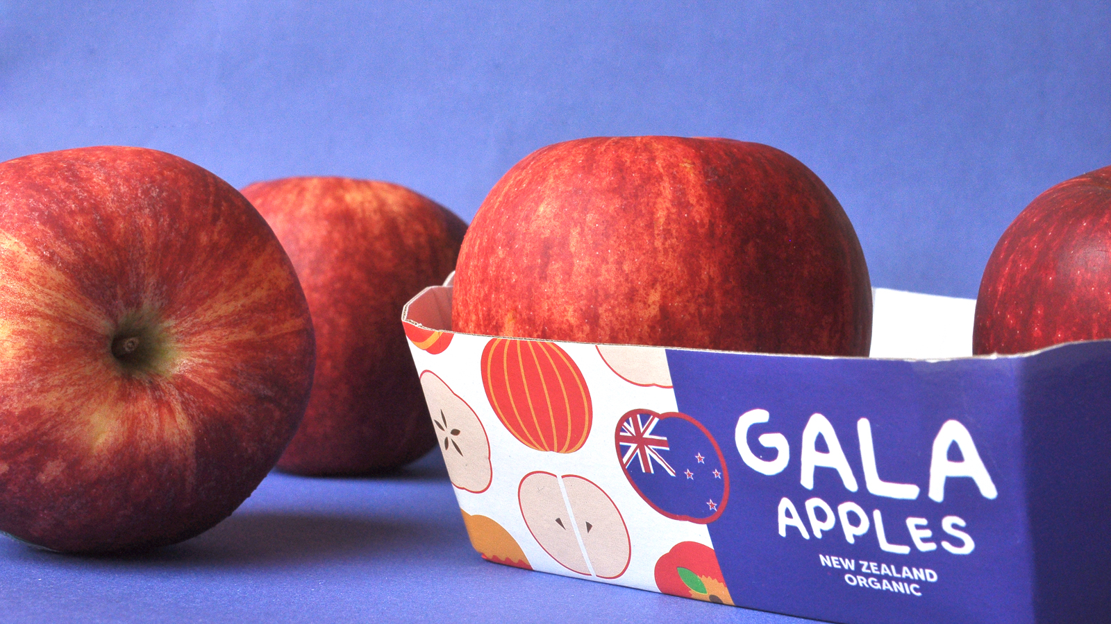 GALA 新西蘭有機(jī)蘋果節(jié)慶敞開式包裝盒設(shè)計(jì)，新西蘭國旗色+扁平圖標(biāo)組合